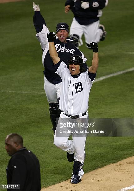 Magglio Ordonez of the Detroit Tigers celebrates as he runs to home plate on his 3-run walk-off home run against Huston Street of the Oakland...