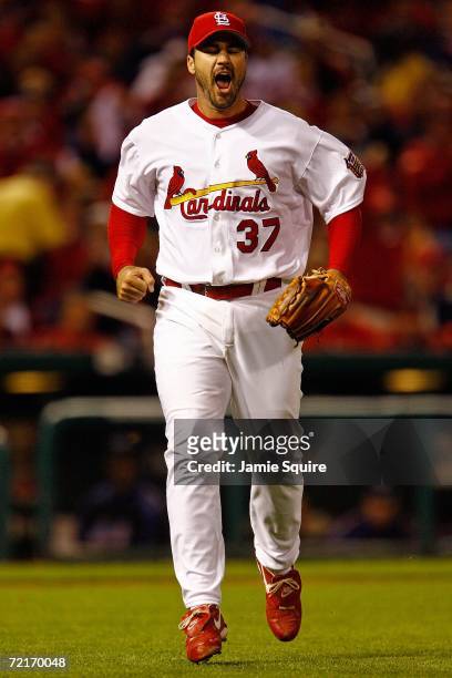 Jeff Suppan of the St. Louis Cardinals celebrates after the last out of the sixth inning against the New York Mets during game three of the NLCS at...