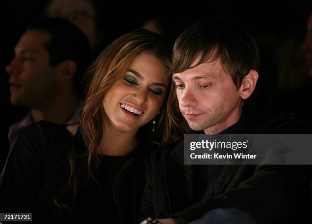 Actress Nikki Reed and actor DJ Qualls attend the Johnnie Walker Dressed to Kilt 2006 fashion show during Mercedes Benz Fashion Week at Smashbox...