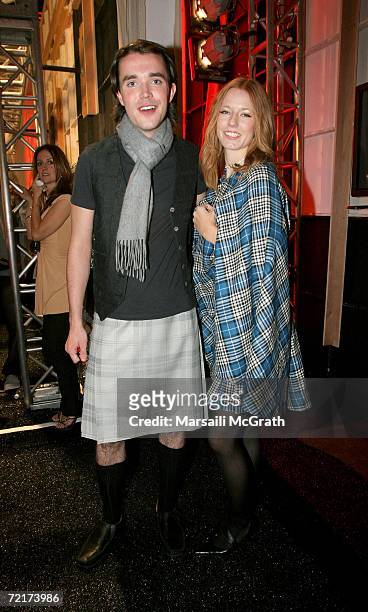 Actors James Robinson and Mhairi Calvey pose backstage at the Johnnie Walker Dressed to Kilt 2006 fashion show during the Mercedes Benz Fashion Week...