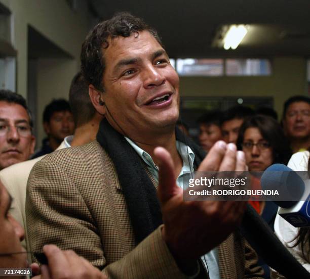 Ecuadorean presidential candidate Rafael Correa listens to the first results of the national elections in Quito, 15 October 2006. Conservative...