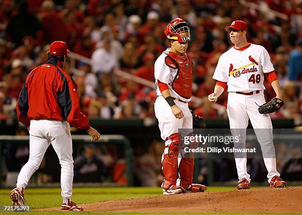 Manager Tony La Russa of the St. Louis Cardinals walks out to the mound to pull Brad Thompson in the fifth inning against the New York Mets during...