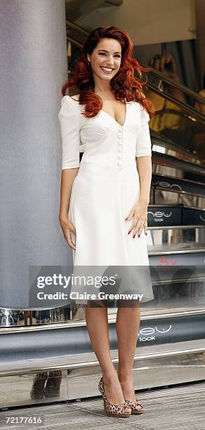 Actress Kelly Brook poses at the launch of her New Look lingerie collection outside the Oxford Street store on October 16, 2006 in London, England.