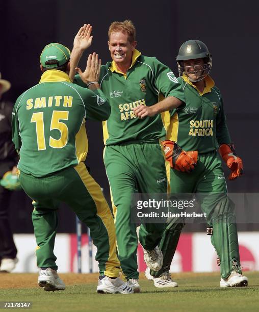 shaun-pollock-of-south-africa-celebrates-the-wicket-of-lou-vincent-of-new-zealand-during-the.jpg