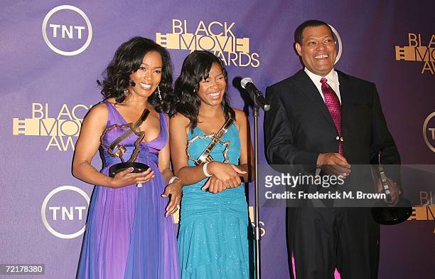 Actresses Angela Bassett recipient of the Outstanding Performance by an Actress in a Supporting Role award, actor Laurence Fishburne recipient of the...