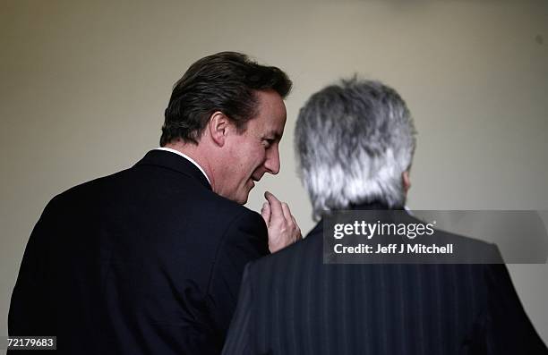 Annabel Goldie, leader of the Scottish Conservatives speakes with David Cameron, Conservative Party leader, as he leaves Scotland's leading...