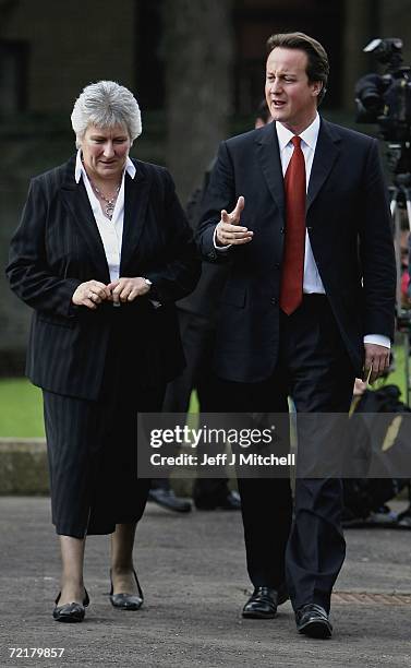 Annabel Goldie, leader of the Scottish Conservatives speaks with David Cameron, Conservative Party leader, as he leaves Scotland's leading disability...