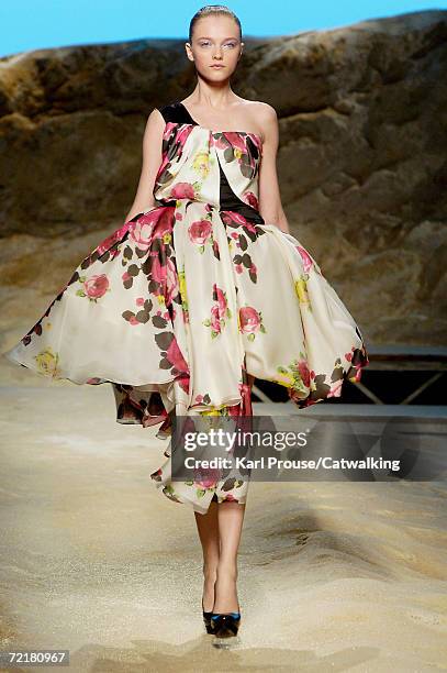 Model walks down the catwalk during the Kenzo Fashion Show as part of Paris Fashion Week Spring/Summer 2007 on October 7, 2006 in Paris, France.