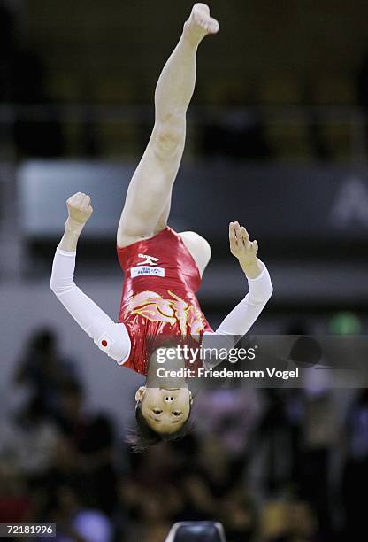 Miki Uemura of Japan performs on the beam in the womens qualification during the World Artistic Gymnastics Championships at the NRGi Arena on October...