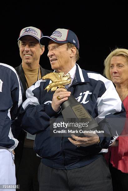 Mike Ilitch of the Detroit Tigers with the American League Championship trophy after the American League Championship Series Game against the Oakland...