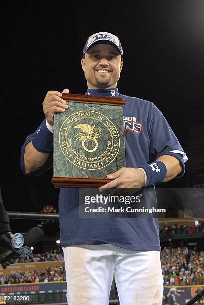 Placido Polanco of the Detroit Tigers with the MVP award after the American League Championship Series Game against the Oakland Athletics at Comerica...
