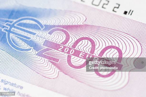 close-up of two hundred euro banknote - two hundred euro banknote stock pictures, royalty-free photos & images