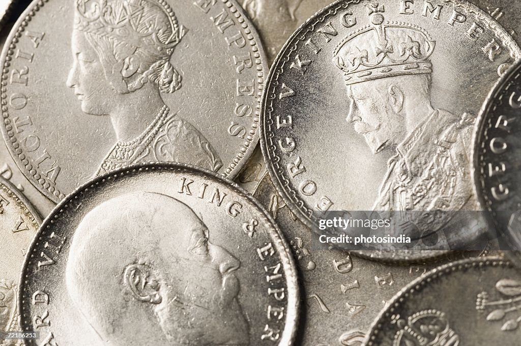 Close-up of Indian silver coins