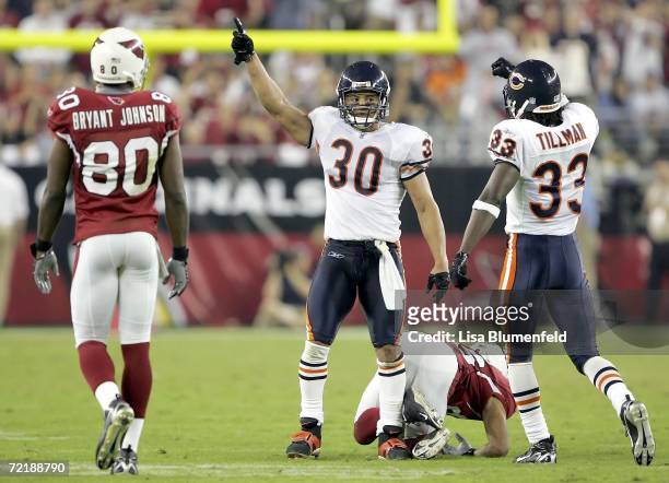Mike Brown and Charles Tillman of the Chicago Bears celebrate in the final seconds of the fourth quarter against the Arizona Cardinals October 16,...