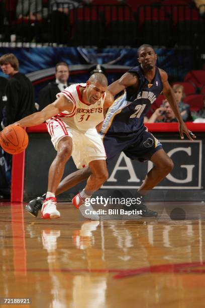 Shane Battier of the Houston Rockets moves the ball against the Memphis Grizzlies during a preseason game on October 10, 2006 at the Toyota Center in...