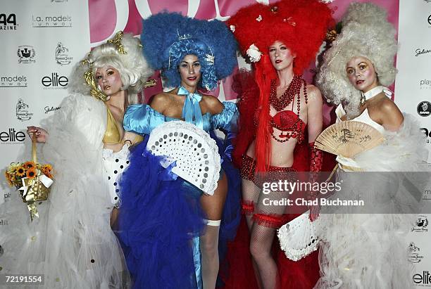 Costumed stage dancers attend 944 Magazine's 'Don't Tell My Booker' party at the Vanguard on October 16, 2006 in Los Angeles, California.