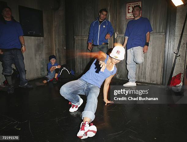 Break dancer dancer performs at 944 Magazine's 'Don't Tell My Booker' party at the Vanguard on October 16, 2006 in Los Angeles, California.