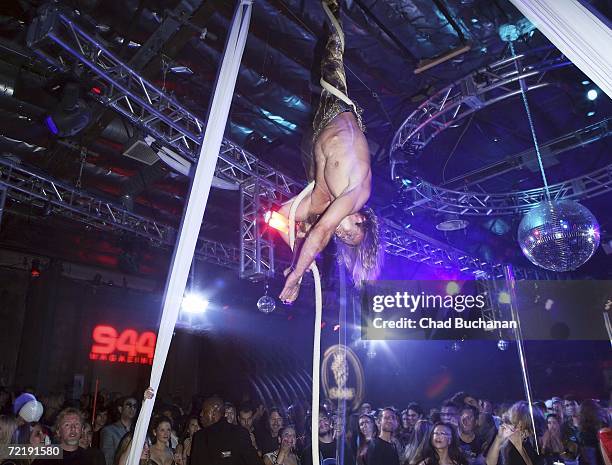 Trapeze artist performs at 944 Magazine's 'Don't Tell My Booker' party at the Vanguard on October 16, 2006 in Los Angeles, California.