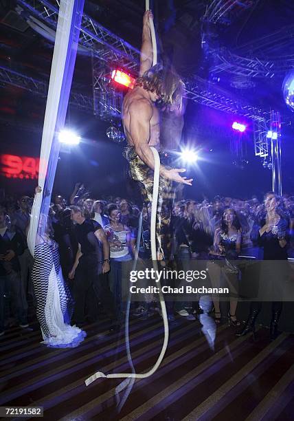 Trapeze artist performs at 944 Magazine's 'Don't Tell My Booker' party at the Vanguard on October 16, 2006 in Los Angeles, California.