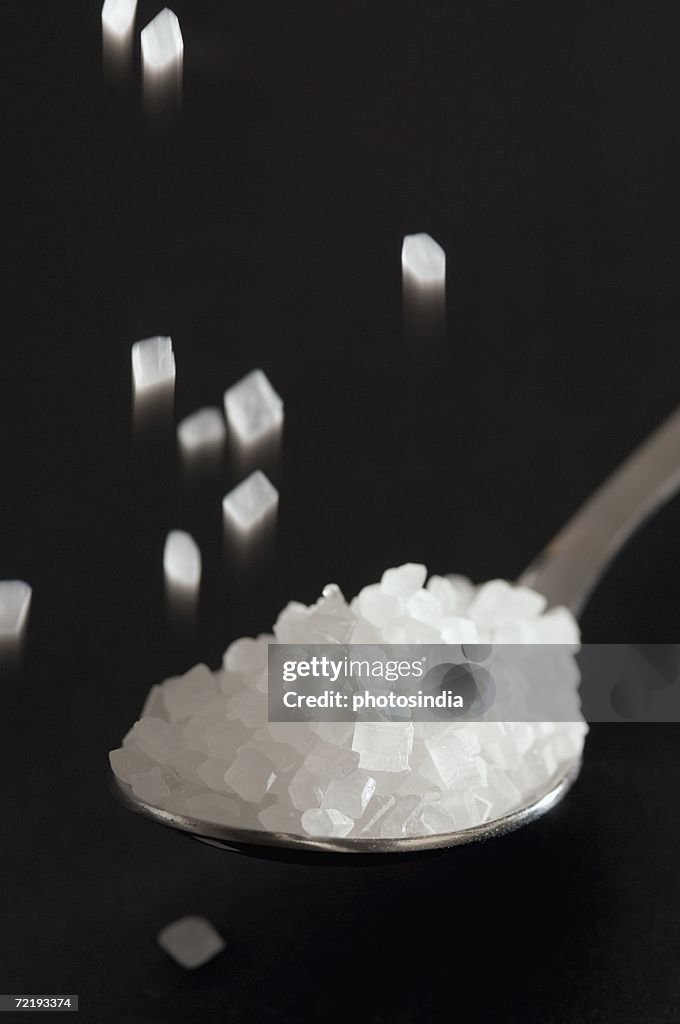 Close-up of a spoon full of sugar