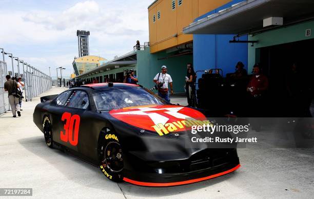 Juan Pablo Montoya, driver of the Texaco/Havoline Ganassi Racing Dodge, returns to the garage after his first laps during NASCAR Nextel Cup Series...