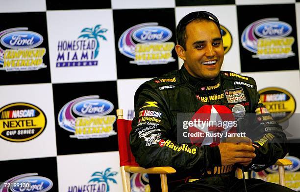 Juan Pablo Montoya, driver of the Texaco/Havoline Ganassi Racing test Dodge, speaks with the media during NASCAR Nextel Cup Series testing at...