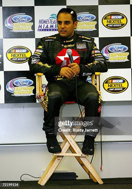 Juan Pablo Montoya, driver of the Texaco/Havoline Ganassi Racing test Dodge, speaks with the media during NASCAR Nextel Cup Series testing at...