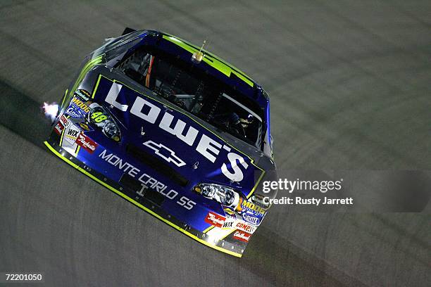 Jimmie Johnson, driver of the Lowes Chevrolet, drives during NASCAR Nextel Cup Series testing at Homestead-Miami Speedway on October 17, 2006 in...
