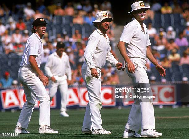 Australian slips Dean Jones, Allan Border and Terry Alderman watch a ball been hit to the fence during the 3rd Test match between Australia and the...