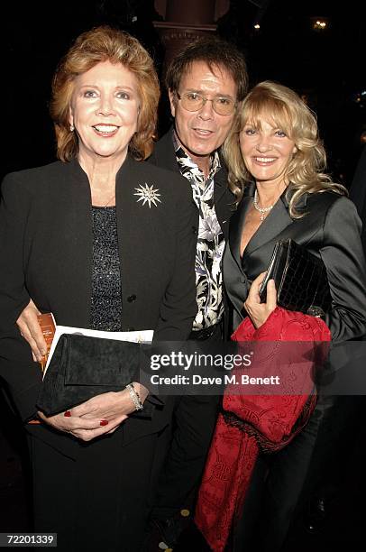 Singer Cilla Black, Cliff Richard and guest attend the West End premiere of Spamalot, at the Palace Theatre October 17, 2006 in London, England.