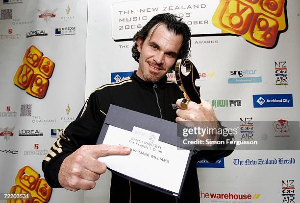 Director Mark Williams poses backstage with his award for Best Music Video in the Awards Room at The New Zealand Music Awards 2006, the Recording...