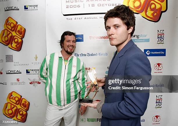 Members of the band Fat Freddy's Drop pose with their award for Highest Selling NZ Album backstage in the Awards Room at The New Zealand Music Awards...