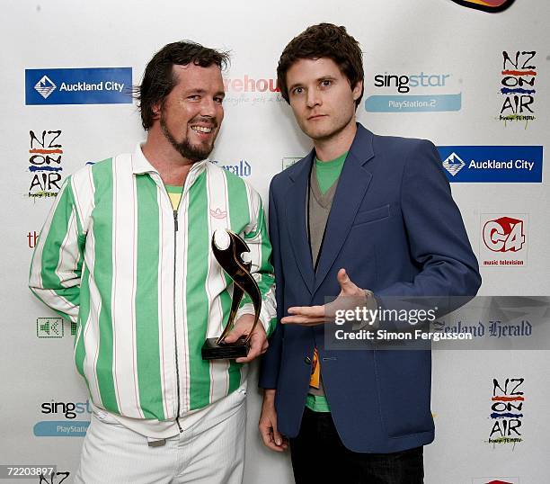 Members of the band Fat Freddy's Drop pose with their award for Highest Selling NZ Album backstage in the Awards Room at The New Zealand Music Awards...