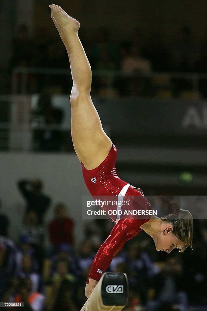 Gymnast Jana Bieger of the USA performs on the beam during the... News