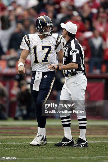 Quarterback Philip Rivers of the San Diego Chargers talks with referee Tony Corrente during a game against the San Francisco 49ers at Monster Park on...
