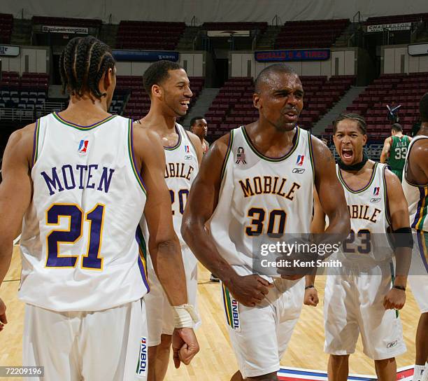 Derek Hood and Rashad Phillips of the Mobile Revelers celebrate there comeback win against the North Charleston Lowgators at the North Charleston...