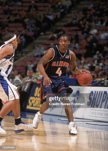 Guard Luther Head of the Illinois Fighting Fighting Illini dribbles the ball over during the NCAA game against the Seton Hall Pirates at the...