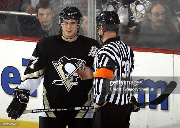 Sidney Crosby of the Pittsburgh Penguins talks with referee Gord Dwyer during a game against the New Jersey Devils on October 18, 2006 at Mellon...