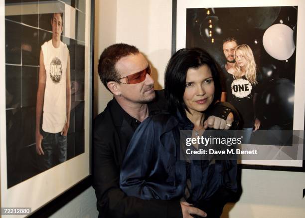 Bono and wife Ali Hewson attend the launch party of 'Edun One' hosted by Ali Hewson, at Harvey Nichols on October 18, 2006 in London, England.