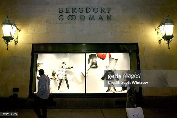 Pedestrians walk past the exterior of the Bergdorf Goodman store during a book signing for Linda Wells' new book "Allure: Confessions of a Beauty...