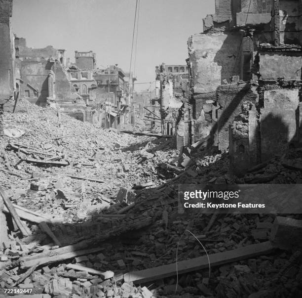 Burned-out and ruined buildings in the Katra Jaimal Singh area of Amritsar after communal violence in the city during the Partition of British India,...