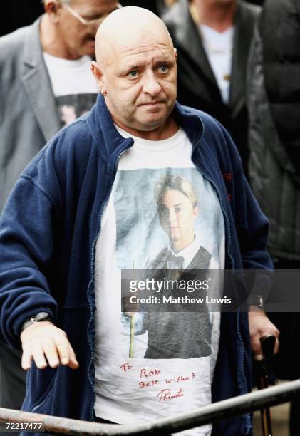 Fan shows his support to Paul Hunter as he attends his funeral at Leeds Parish Church on October 19, 2006 in Leeds, England. The three-time Masters...