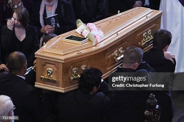 The coffin of snooker star Paul Hunter leaves Leeds Parish Church during his funeral on October 19, 2006 in Leeds, England. The three-time Masters...