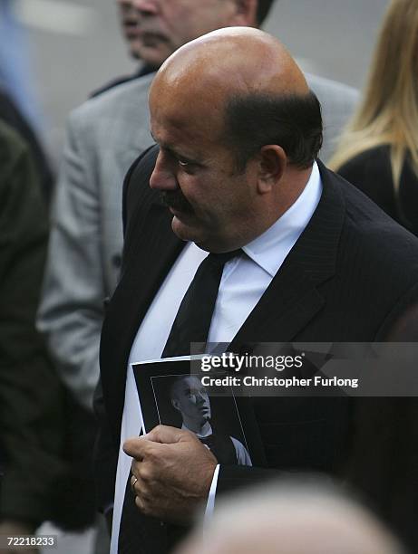 Snooker player Willie Thorne attends the funeral of snooker star Paul Hunter at Leeds Parish Church during his funeral on October 19, 2006 in Leeds,...