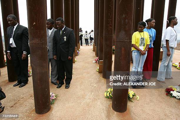 Family members of the people who died in a plane crash with late President Samora Machel pay their respect 19 October 2006 in Mbuzni at a memorial...