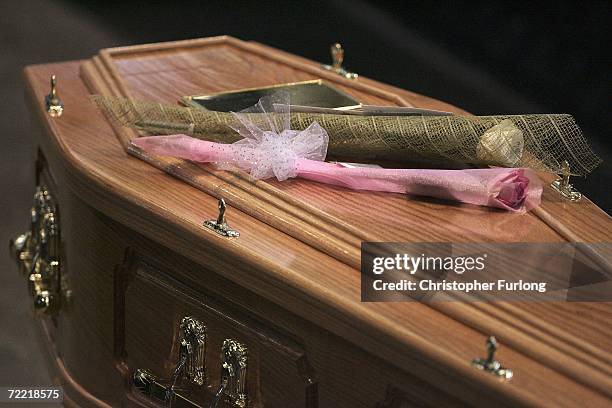 Flowers lay on the coffin of snooker star Paul Hunter during his funeral at Leeds Parish Church on October 19 Leeds, England. The three time masters...