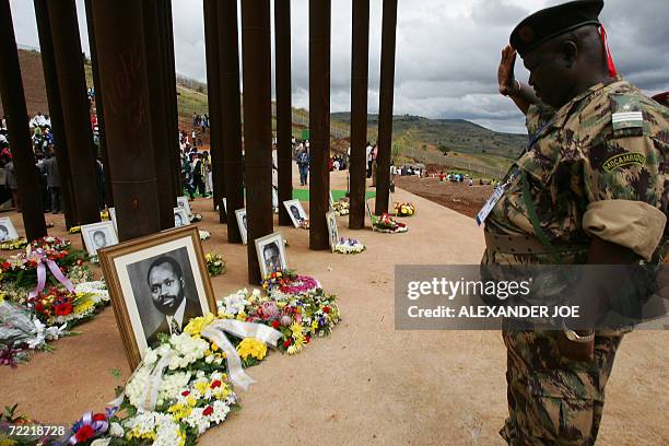 Mozambican soldier pays his respects at the memorial on the Mbuzini hillside where Mozambican President Samora Machel died 20 years ago in a plane...