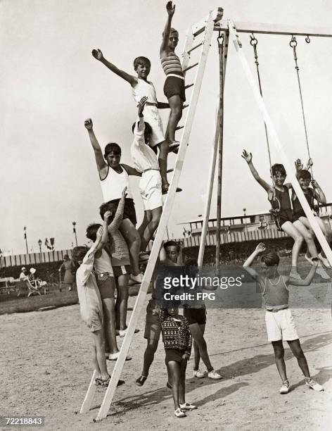 Society children crowd the open-air gymnasium at the new Deauville summer school, 31st July 1929.