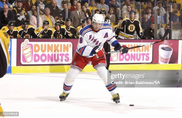 Jaromir Jagr of the New York Rangers takes slap shot against the Boston Bruins during a preseason game at the TD Banknorth Garden on September 30,...