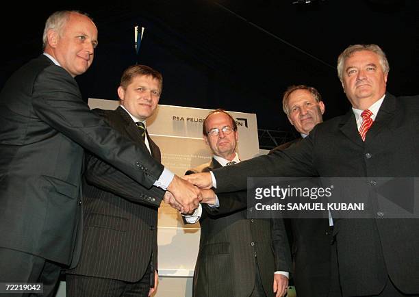 President of the Supervisory Board of French car maker PSA Peugeot-Citroen Thierry Peugeot, Slovakian Prime Minister Robert Fico, President and Chief...